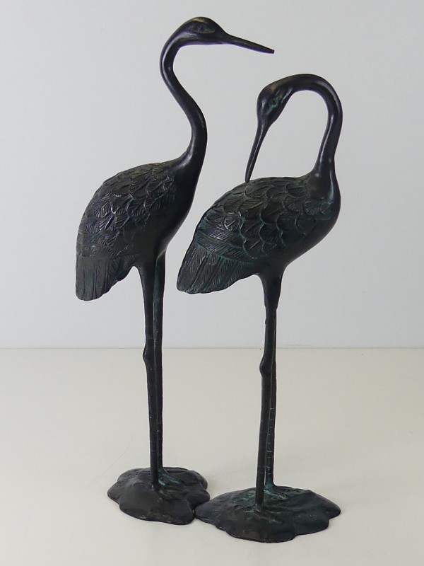 Bronzen kraanvogels figuren