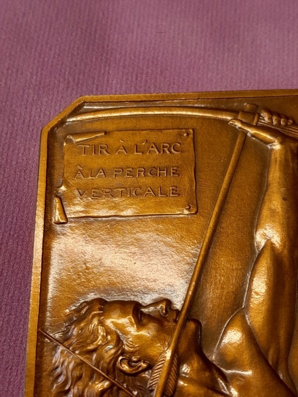 Bronzen medaille: Tir à l'arc à la peche verticale - Beckers