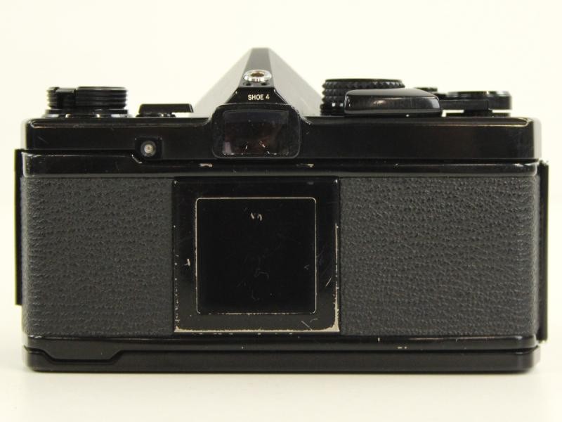 Vintage Olympus OM-2 spiegelreflexcamera met extra lenzen in draagtas