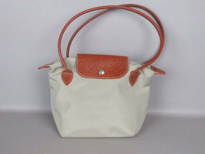 Kleine beige dameshandtas gemerkt Longchamp