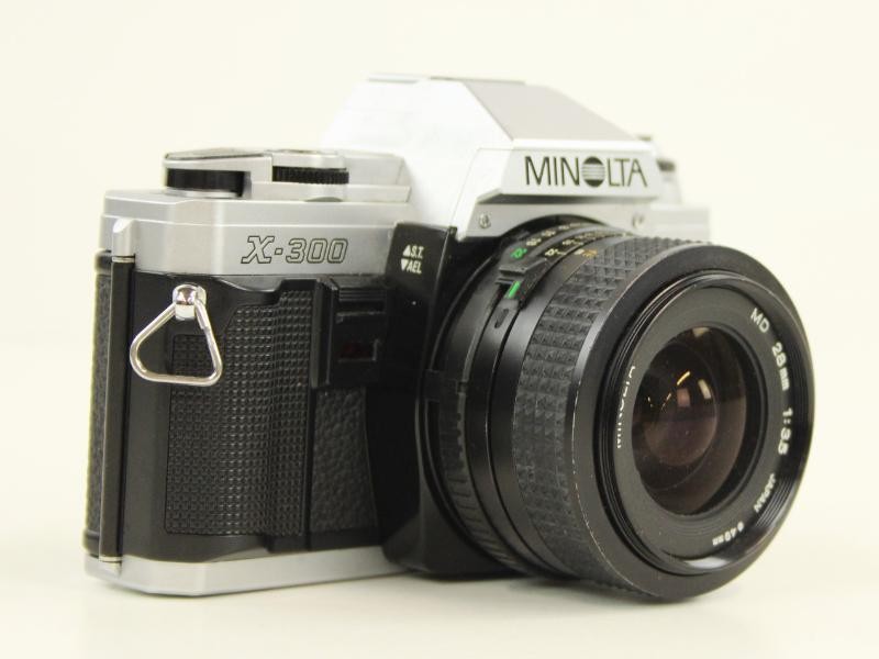 Minolta X-300 fotocamera chroom + 3 lenzen