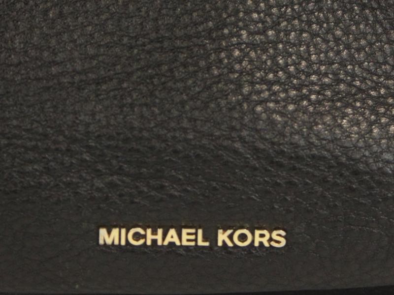 Mooie zwart lederen, vintage handtas gemerkt Michael Kors