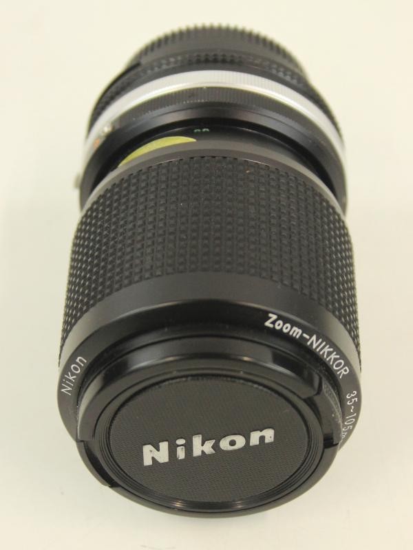 Nikon FE 35 mm fotocamera met extra lens - in een mooie draagtas