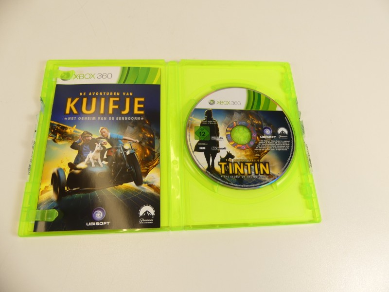 Lot Kuifje strip + game + figuurtjes