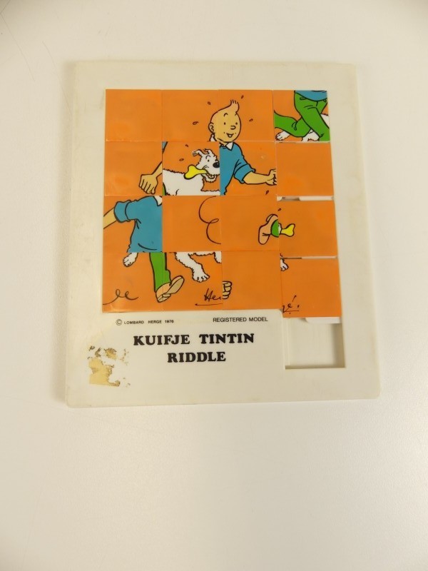 Lot Kuifje strip + game + figuurtjes