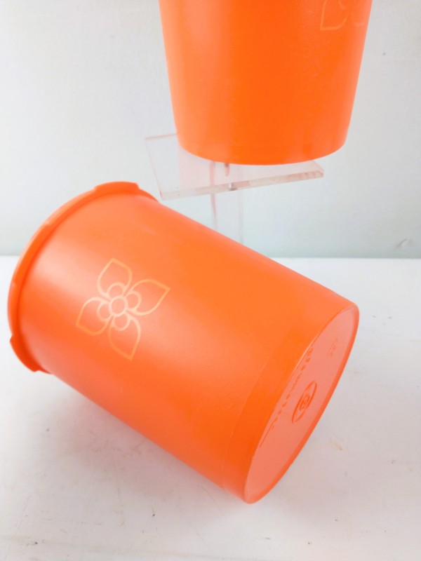 Grote set ronde oranje Tupperware potjes