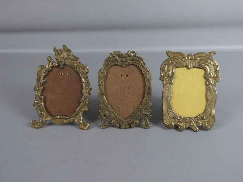 Drie messing fotolijstjes